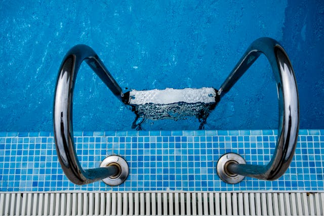 how to lower cyanuric acid in pool