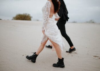 Amal Clooney Wore a Sheer Minidress With Knee-High Boots