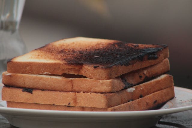Burnt Toast Has a Strong One Crossword Answer Explained