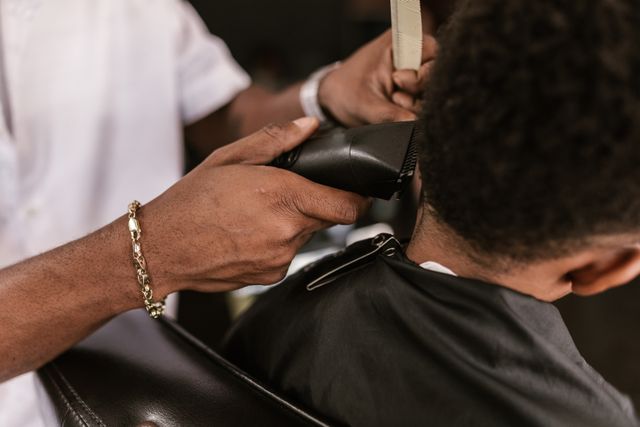 Mid Taper Fade Black Male Clean, Sharp, Modern